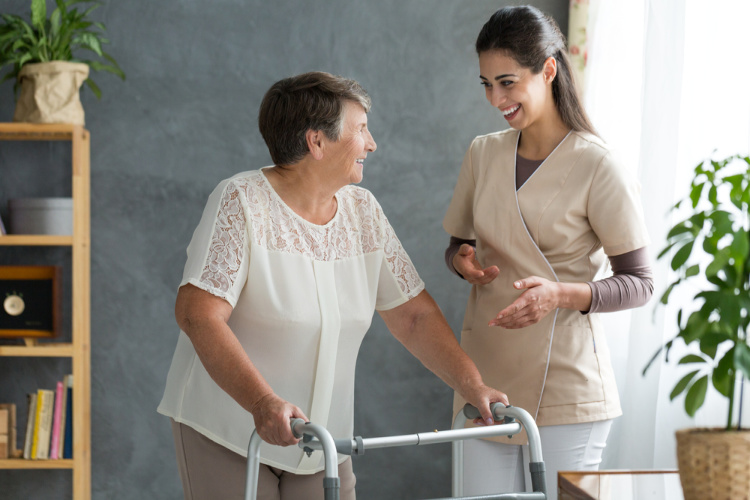 Cannabis and Parkinsons caregiver helping patient